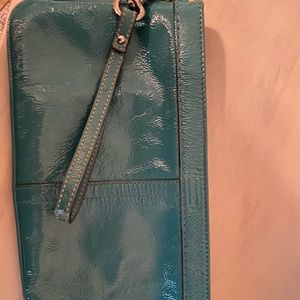 COACH teal wristlet clutch